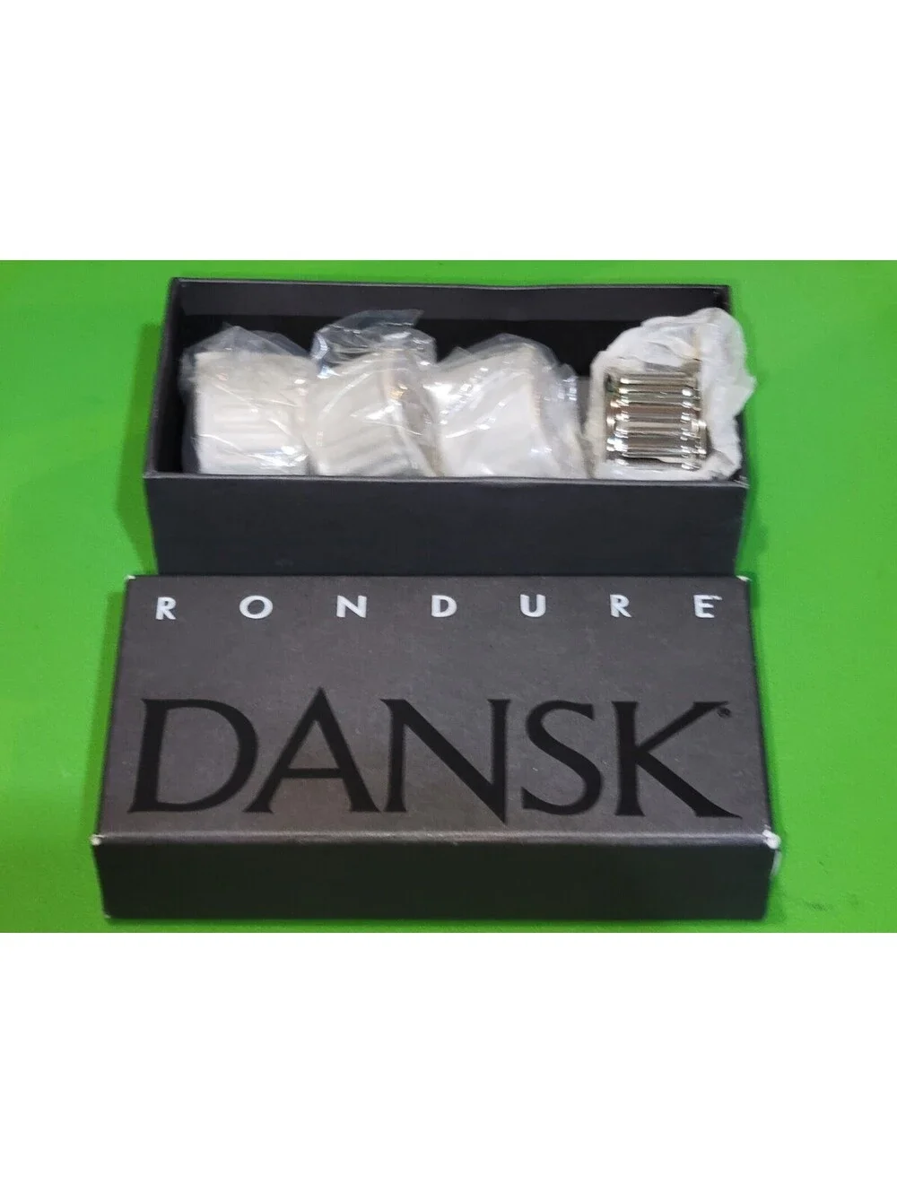 DANSK RONDURE SILVER TONED NAPKIN RINGS ~ SET OF 4
